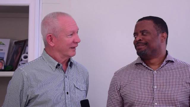 (l-r) Richard Pavitt an organiser of the Nevis Blues Festival, and Deputy Premier and Minister of Culture Hon. Mark Brantley at the Nevis Island Administration offices at Bath Hotel